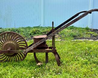 Antique Cast Iron Garden Push Planter Plow Seeder ( Located at building # 2 )