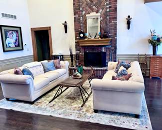 White Tufted Sofas, Area Rug, and Home Decor ( Coffee Table Not For Sale )