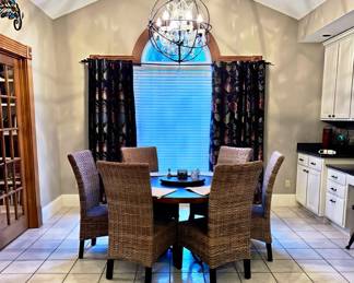 Arhaus Copper Top Dining Table and Rattan Dining Chairs