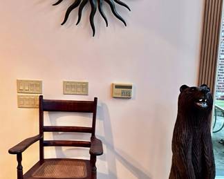 Vintage Chair, Carved Wooden Bear and Sun Wall Art