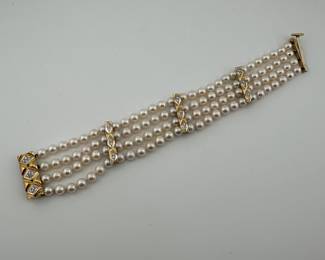 Stunning 14k gold diamond four strand pearl cuff bracelet 