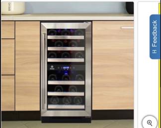 Vinotemp 28 bottle wine cooler with dual zone cooler and touchscreen controls.