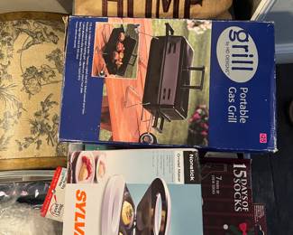 New in box Portable Gas Grill, $25
NIB Sylvania omelette maker, $20
NIB 15 days of Christmas socks, $10
Home sweet home pillow, $5