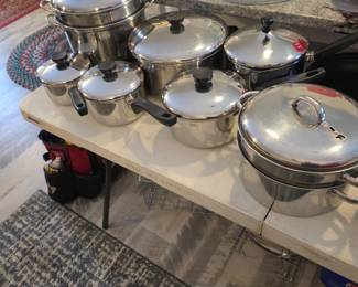 Farberware Pots with lids, Glass9x13, Pyrex covered rounds, Tupperware white and red.