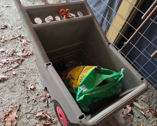 Small gardening wheel barrel, dirt