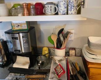 Coffee machine, BBQ utensils, Assorted knives, Glass creamer, Salt & Pepper shakers, Copper shaker, mugs, flour sifter