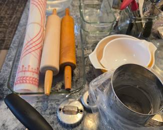 Rolling pins, biscuit cutter, Corning mixing bowls, Flour sifter, Cookie Scoops, Ice cream Scoops, Potato masher