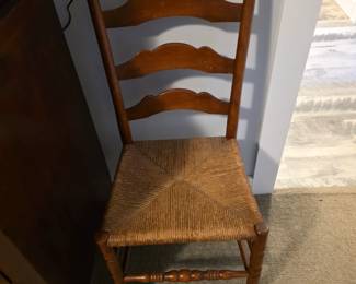 Vintage wooden ladder-back side chair with rush seat