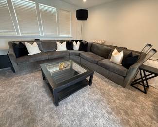 Modern Charcoal Gray Sectional Sofa with Black Wood and Glass Coffee Table