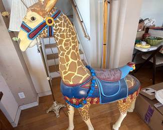 large decorative carousel-style giraffe figure