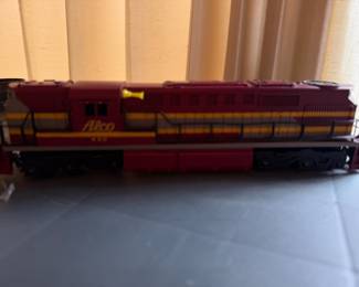 vintage HO scale model train, specifically a Gilbert American Flyer Alco DL-600 diesel locomotive. 