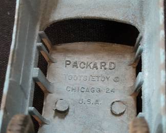 vintage Tootsietoy 1956 Packard sedan, specifically the two-toned blue and white model. 