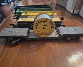 vintage American Flyer No. 636 depressed-center flatcar, manufactured by the A. C. Gilbert Company in New Haven, Connecticut. 