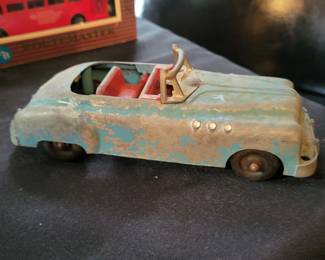1940s Hubley Kiddie Toy Buick Convertible No. 465, a diecast toy manufactured in Lancaster, PA. It features a blue body, red interior, and black rubber tires, o
