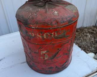 vintage red metal safety gasoline can
