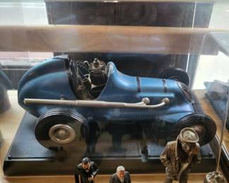 vintage Cox Thimble Drome Champion tether car, a popular gasoline-powered model race car from the 1940s and 1950s in a case