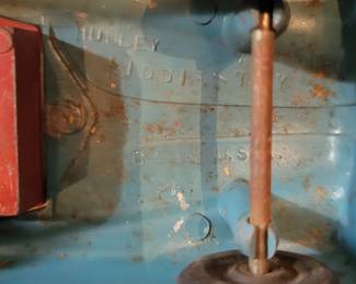 1940s Hubley Kiddie Toy Buick Convertible No. 465, a diecast toy manufactured in Lancaster, PA. It features a blue body, red interior, and black rubber tires, o