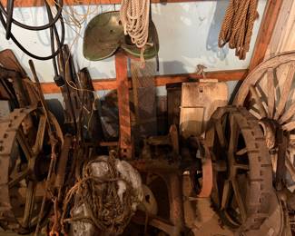 vintage agricultural implement pulled by horses used for cutting hay