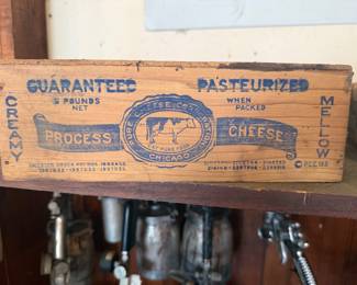 vintage wooden crate was originally used to package and ship "Eat Pure Food" brand pasteurized process cheese. 