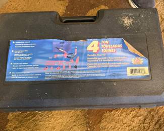 4-ton hydraulic porta power kit, a tool used for heavy-duty automotive repair, pushing, pulling, bending, and straightening frame components
