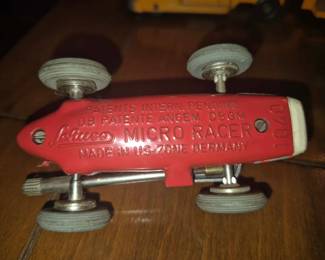 vintage Schuco Micro Racer 1040, a die-cast wind-up toy car produced in the U.S. Zone of Germany during the 1950s. 