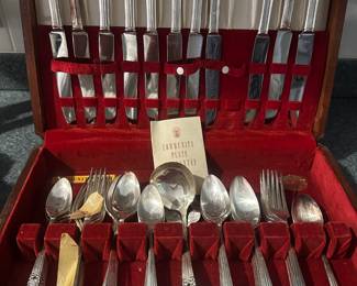 vintage Community Plate silverplate flatware set in the "Coronation" pattern, introduced by Oneida in 1936. 
svc 12 (missing 1 knife)