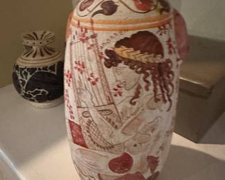 replica of an Ancient Greek oil flask known as an aryballos. 
