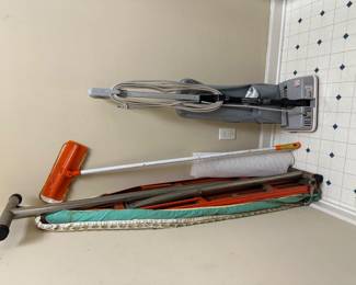 Ironing board, Oreck XL Commercial upright vacuum cleaner, 