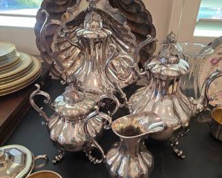 One of several silverplate teaset / coffee sets