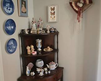 Antique mahogany corner display set of shelves; inlaid wood music box side table with long legs; Royal Copenhagen plates; antique and vintage porcelain curios
