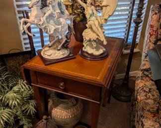 Nice leather top, drop side table