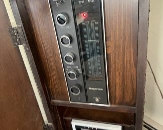 It's a Magnavox Radio Tower Console with 8 track tape deck wicked cool!  Works great!