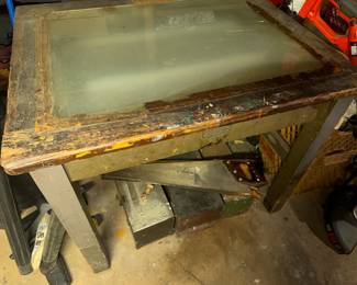 electrified drafting table with light, well loved and worn
