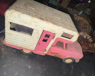 Pink Tonka toy camper truck, also well loved