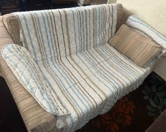 matching pair of loveseats, worn but comfy