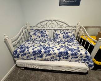 White metal daybed with trundle; 2 new mattresses 