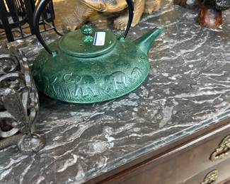 Antique cast iron teapot marked TEAVANA