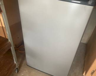 small fridge  - working -- love this house !!  and everything in it 