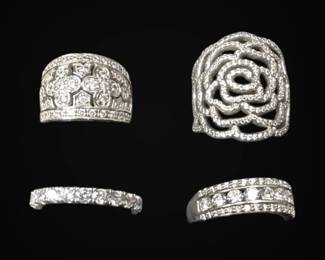 Four Sterling Silver Rings, Size 6.757 21.69g Total