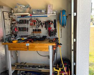 Air compressor with hose's.  Several hand tools, & electrical supplies. 