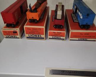 Lionel 6464-525 Box car, Lionel 3562-76 Operating Barrel Car, Lionel 3444 Animated Gondola Car, Lionel 3530 Operating Generator Car, 