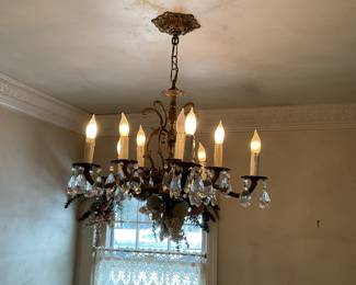 Antique chandelier with drop crystals.
