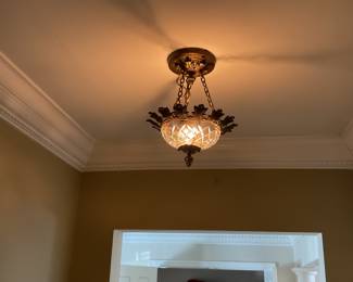 Antique glass and metal chandelier.