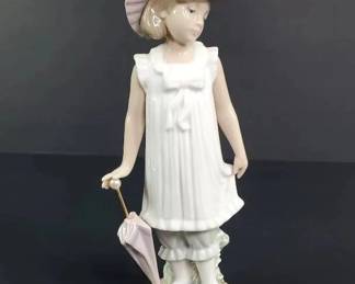 NAO by Lladro April Showers Figurine