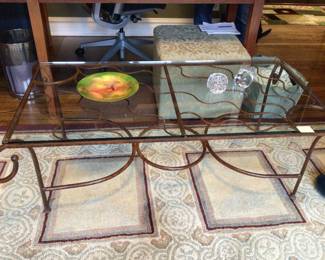 Wrought iron glass top table.