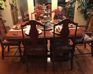 Solid wood trestle table with six chairs