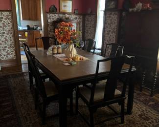 Modern Farmhouse/Harvest Dining Set, Wood table Table Length 60" – 72" Table Width Approx. 36" - 42" with 6 wooden Spindle-Back Chairs. Condition: Sturdy wood, Good : natural-toned plank top and black-stained chairs, Late 20th to early 21st century, Condition: