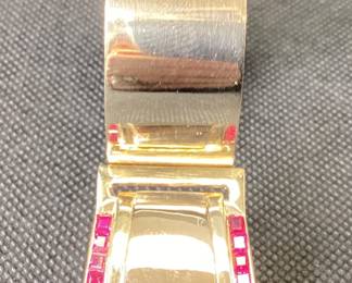 1950â€™s Gutenstein Brothers 14k Buckle Bangle With Over 3 Ctw Of Rubies 42.2g This 1950â€™s Designer Buckle Bangle Features 26, 12pt Princess Cut Rubies And 2, 15pt Cabochon Rubies, One On Each Side. This Bracelet Was Also Designed To Function As A Dress Clip. This Piece Is Guaranteed To Turn Heads At Every Occasion. Carat Weights Are Appropriate.