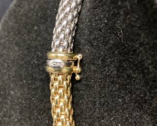 Fope 18k Two Tone Chain And Bracelet 103.35 Grams Made By Fope In Vincenza Italy From Their Prima Line. This Elegant Flexâ€™it 18k White And Yellow Gold Chain And Bracelet Makes A Bold Statement Any Where In The World. The Chain Is 17 3/4 Inches Weighing 65.7 Grams And Bracelet Is 8 1/4 Inches Weighing 37.6 Grams. These Pieces Can Be Combine As An Extra Extravagant Chain Or As Two Head Turning Pieces Jewelry.