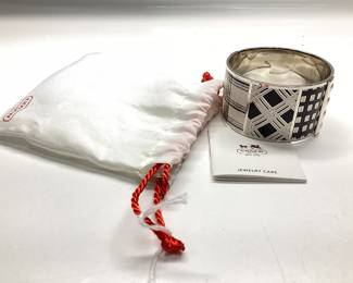  COACH CHUNKY CUFF DESIGNER BRACELET WONDERFUL SILVER TONE WITH MINIMALIST ABSTRACT PATTERN DESIGN. COMES WITH COACH BAG FOR STORAGE.